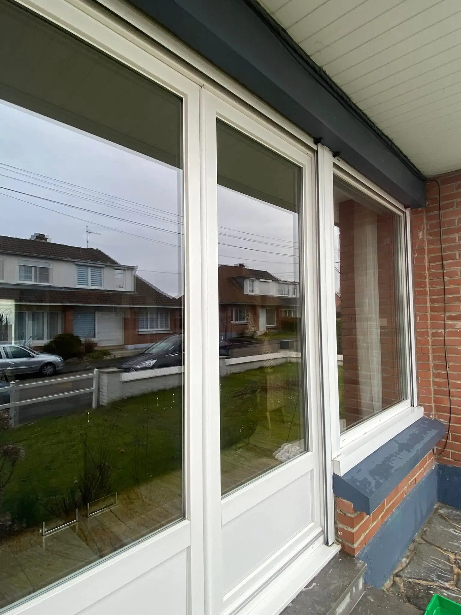 Nettoyage de baie vitrée à Toufflers, par Paandawlv, Laveur de vitres professionnel