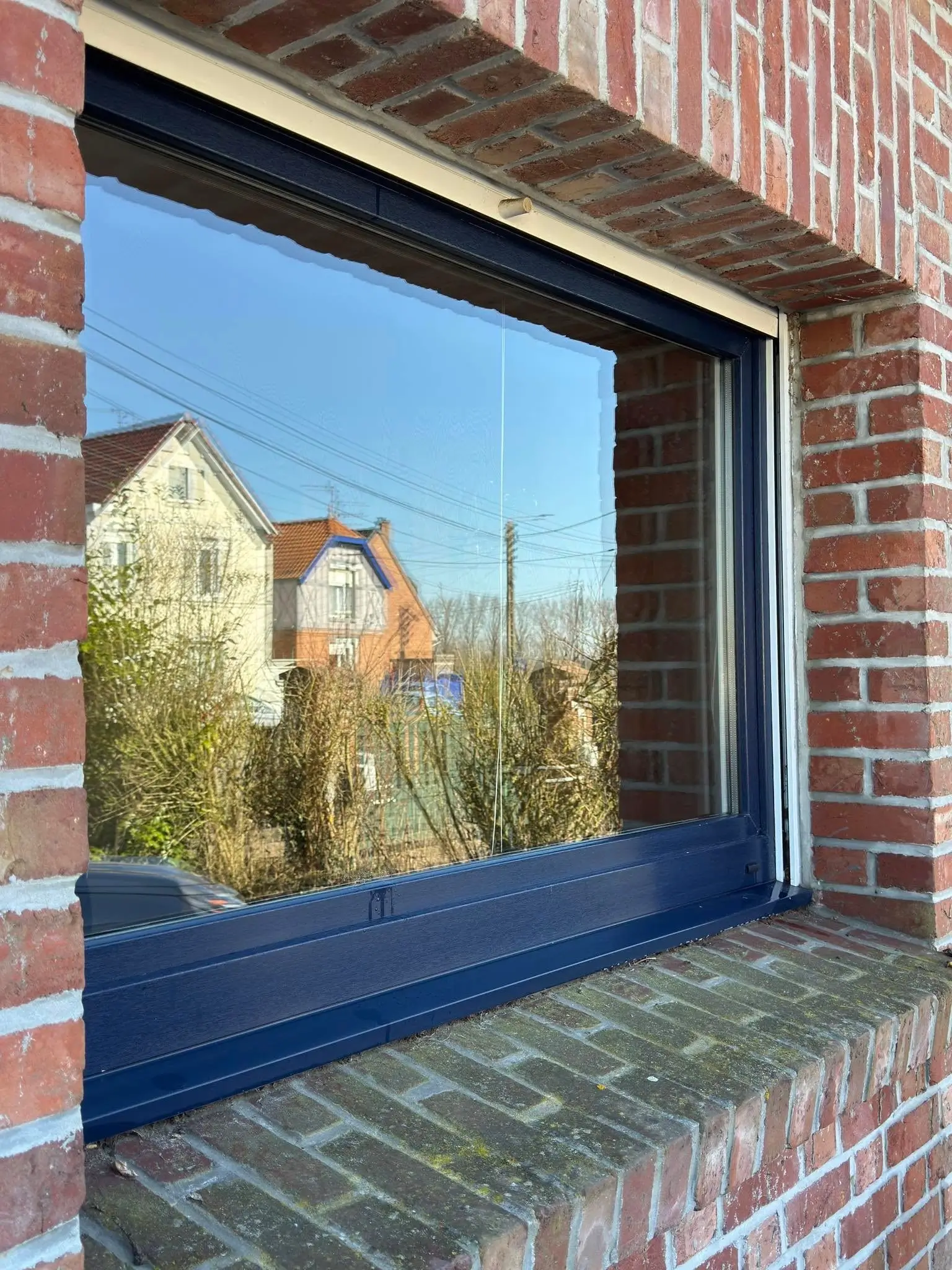 Nettoyage des vitres à Merignies, par Paandawlv, Laveur de vitres professionnel